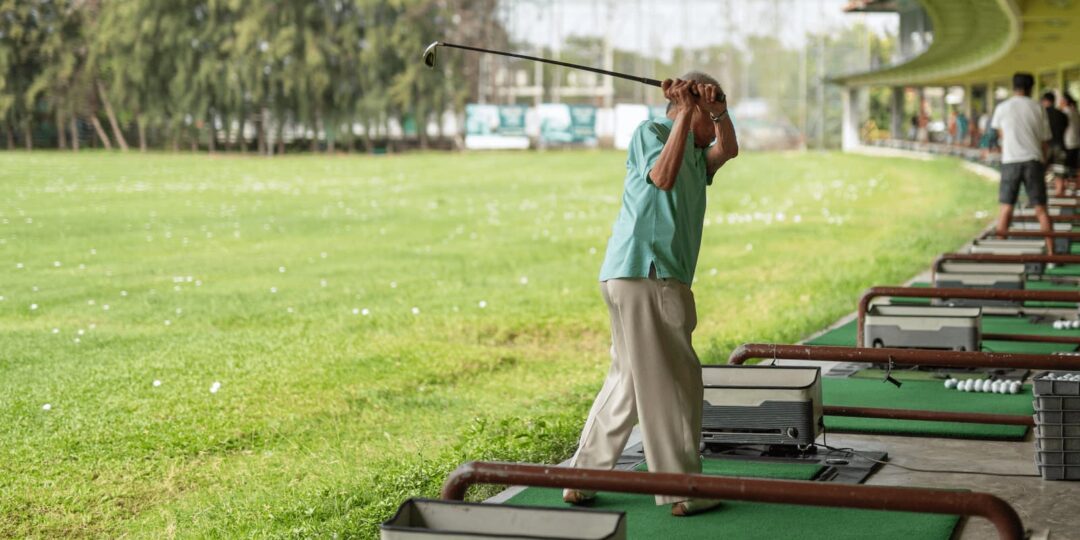 golfer practicing at a Tampa golf driving range
